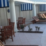 drop-down-titan-screen-dividers-with-sunbrella-fabric-for-the-breakers-hotel-by-miami-awning-co